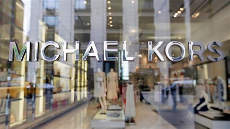 how much did michael kors buy versace for|is versace still in business.